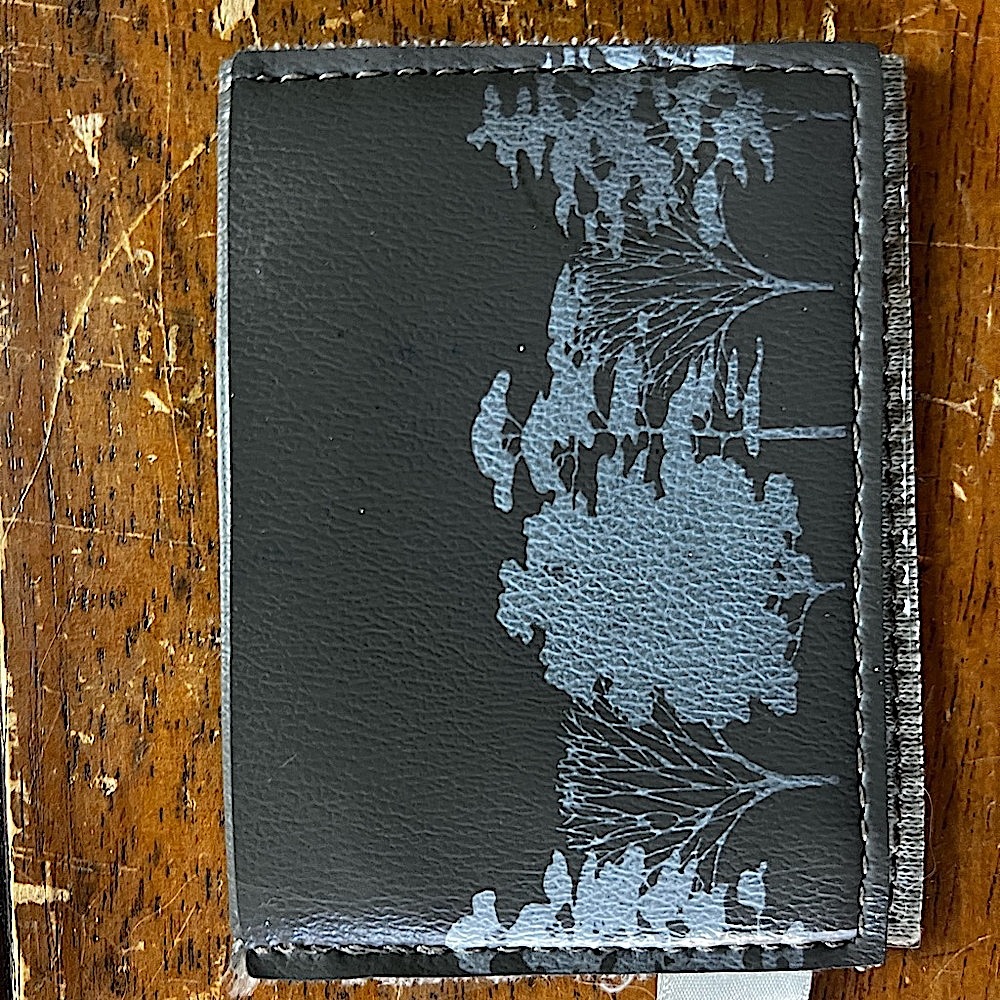 Gray Oaklandish wallet w a silver leaf pattern
